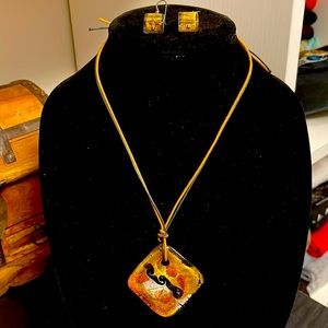 A glass necklace and earrings set